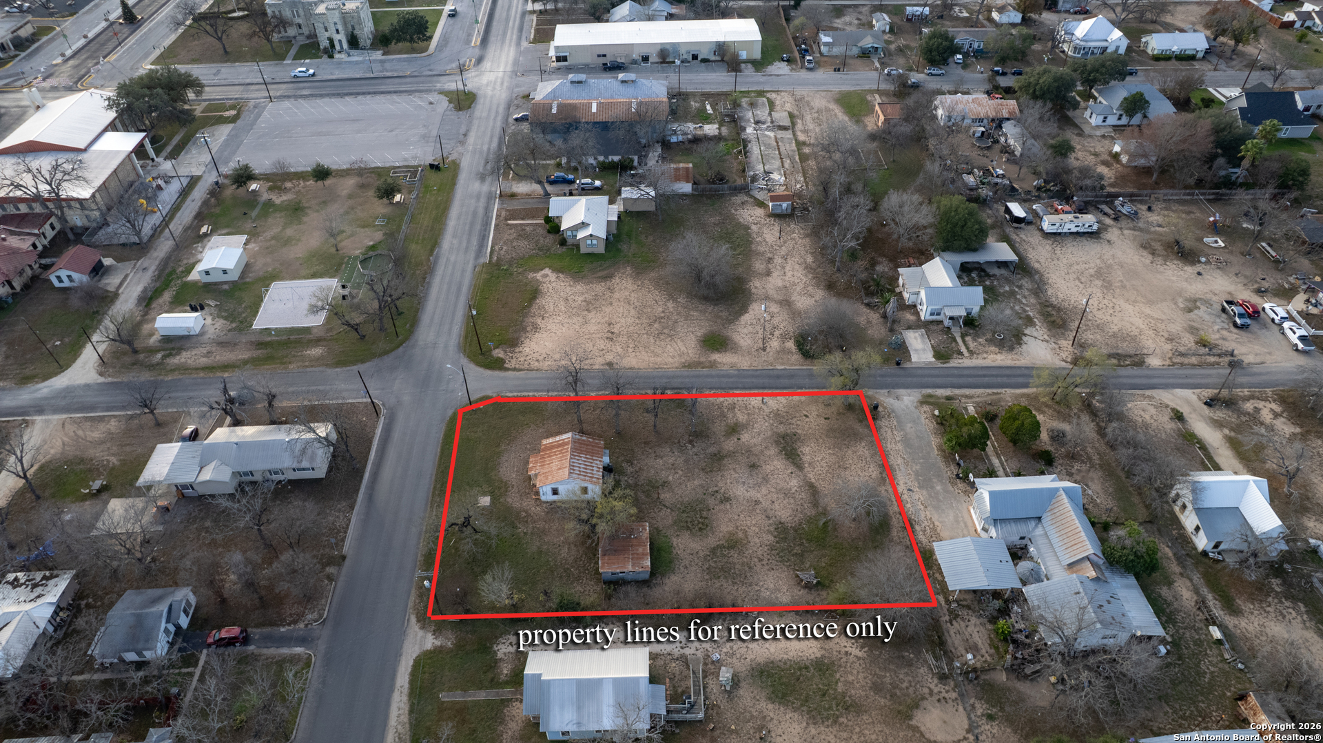 910 15th Street Hondo, TX 78861 - Photo 13 of 26 an aerial view of a residential houses