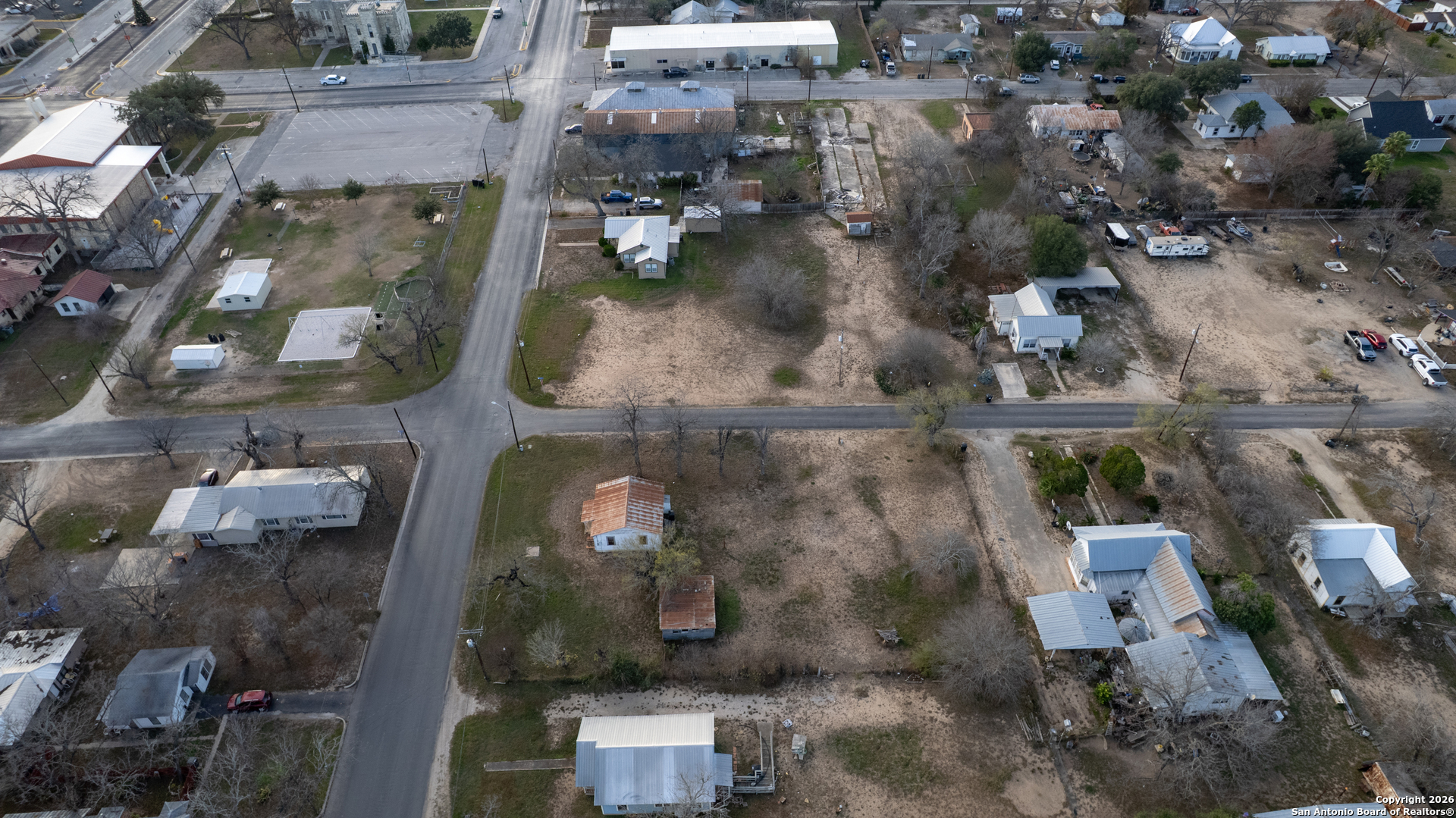 910 15th Street Hondo, TX 78861 - Photo 14 of 26 an aerial view of a houses with outdoor space
