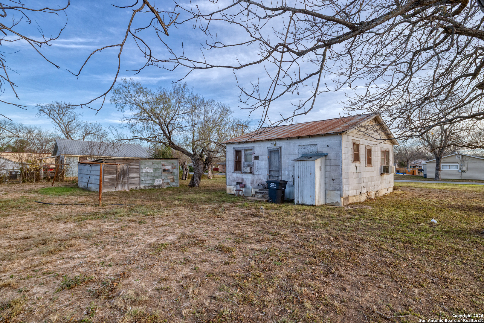 910 15th Street Hondo, TX 78861 - Photo 26 of 26 a view of a house with a yard