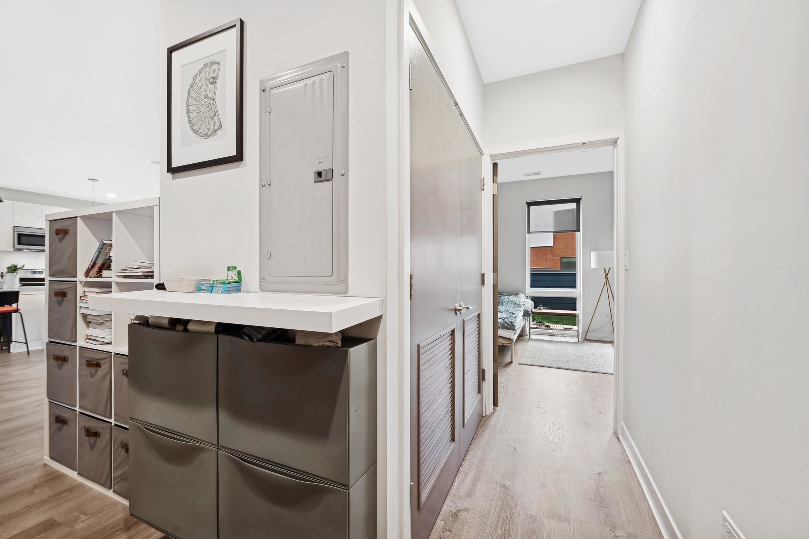 4027 North Broadway Chicago, IL 60613 - Photo 21 of 25 a kitchen with a refrigerator and a sink