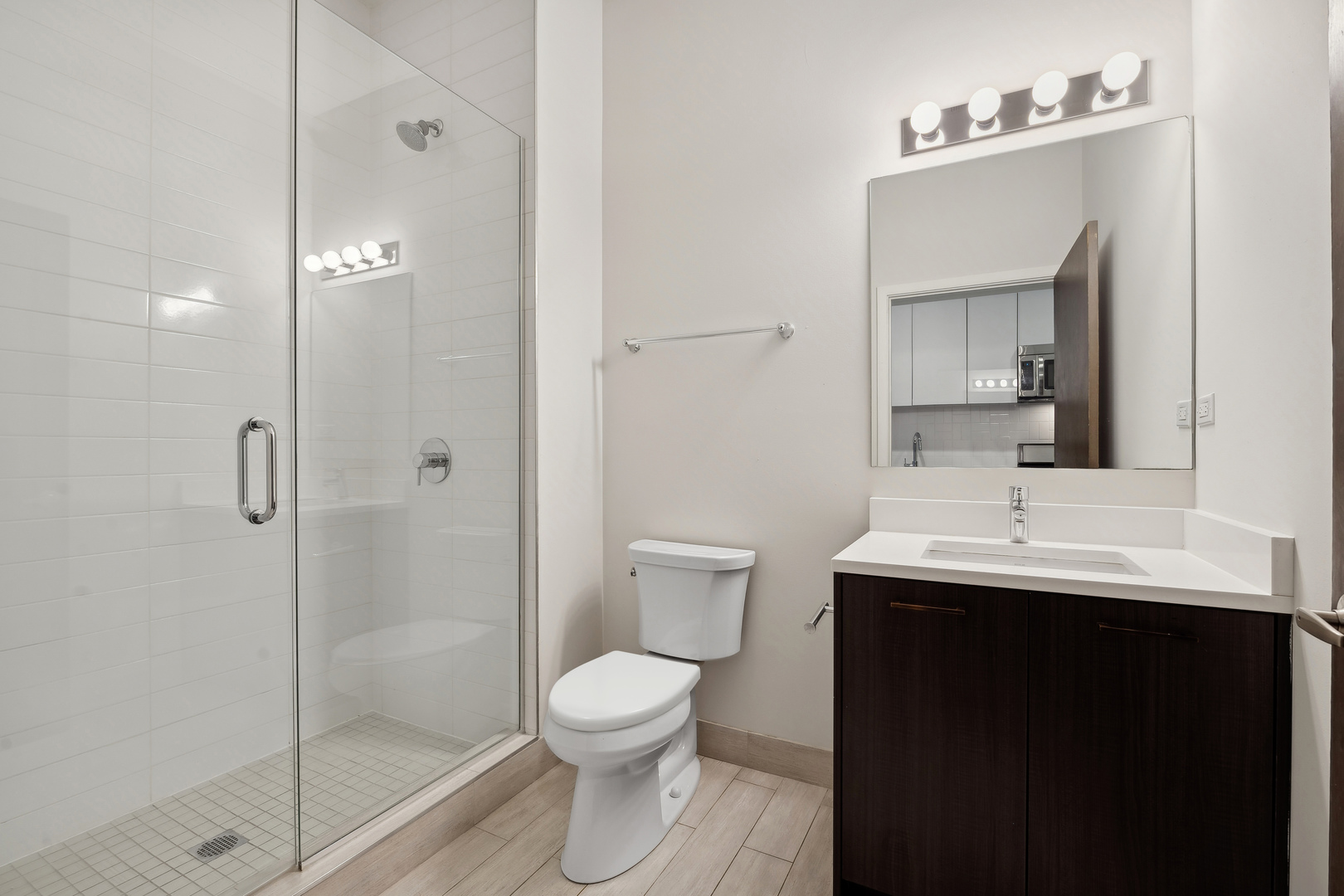 4027 North Broadway Chicago, IL 60613 - Photo 10 of 25 a bathroom with a sink toilet and shower