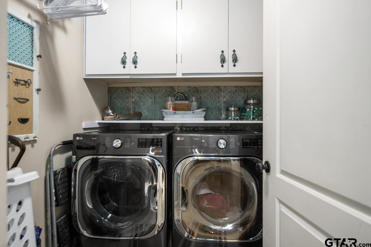 751 Houston Street Lovelady, TX 75851 - Photo 14 of 25 a utility room with dryer and washer