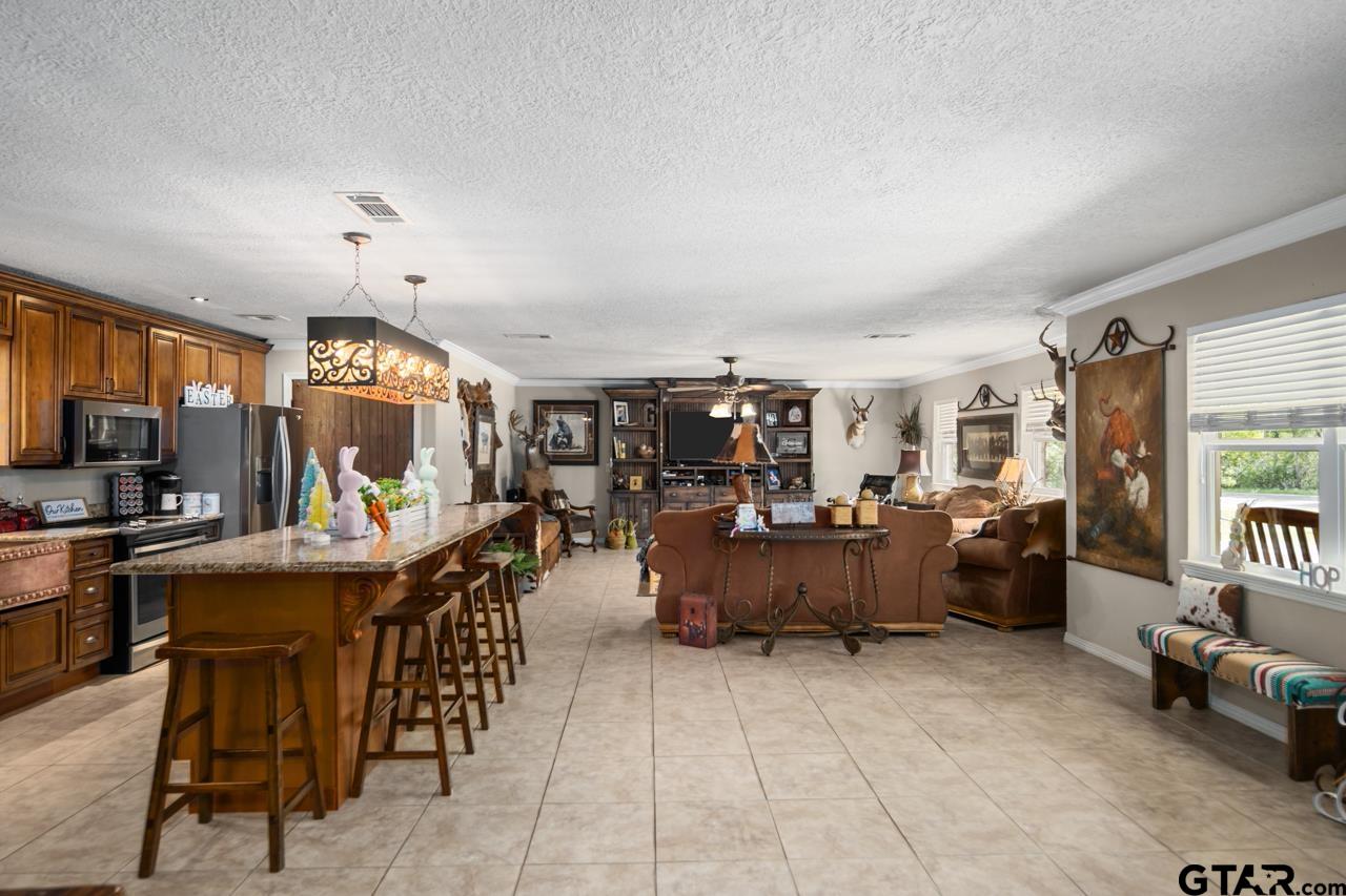 751 Houston Street Lovelady, TX 75851 - Photo 5 of 25 a view of a dining room with furniture