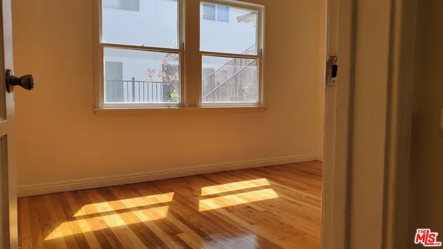 a view of an empty room and window