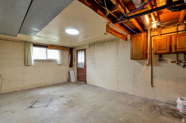 447 550 South Bountiful, UT 84010 - Photo 22 of 25 Unfinished basement with concrete flooring and concrete block walls