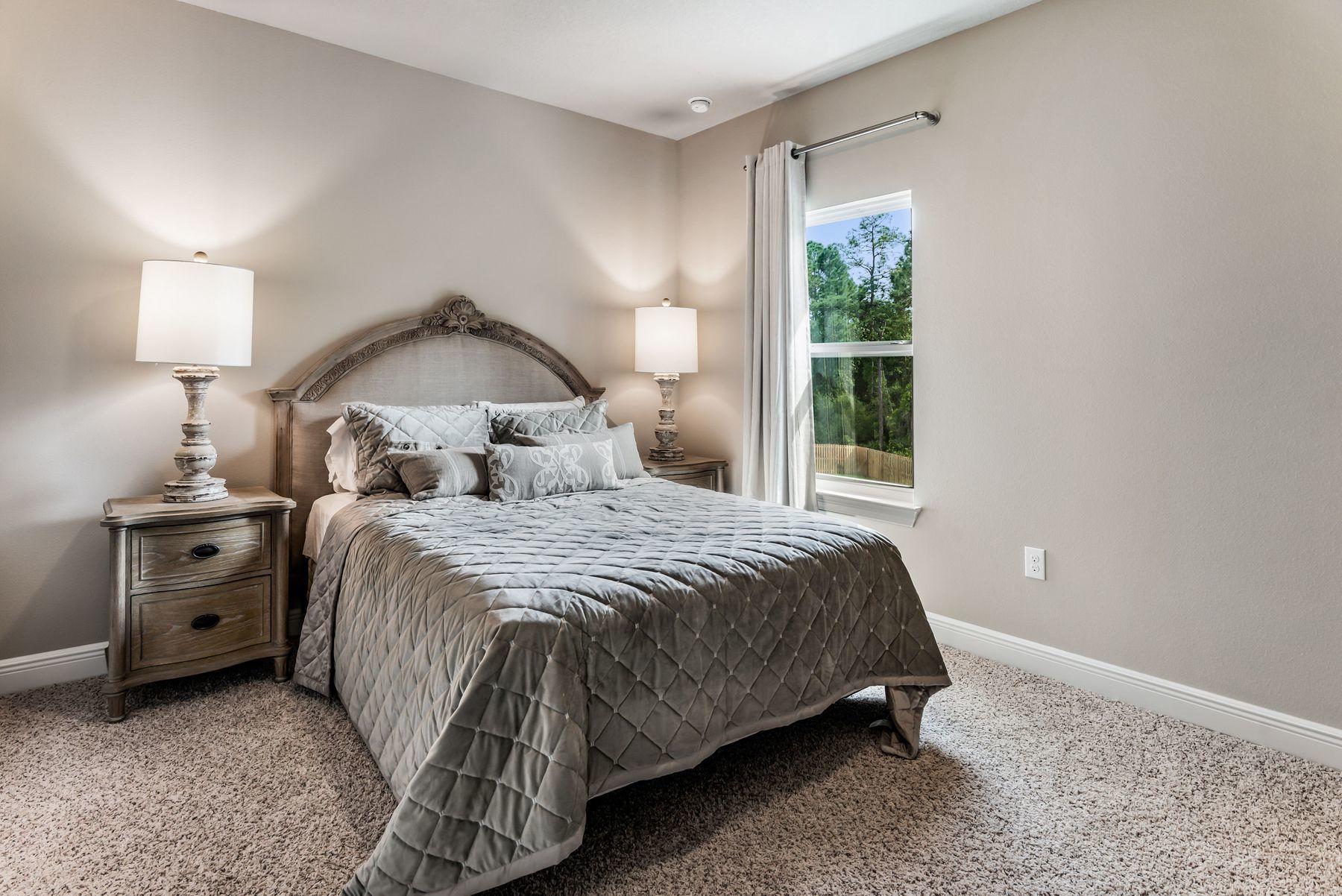 41 Constance Court Santa Rosa Beach, FL 32459 - Photo 18 of 19 a bedroom with a bed and a window