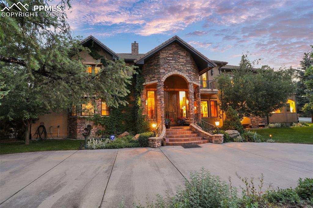 a view of house with outdoor space and street view