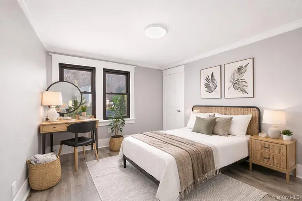 a bedroom with a bed and a table