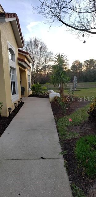 8521 Crystal Cove Loop Kissimmee, FL 34747 - Photo 12 of 23 a view of a house with a yard