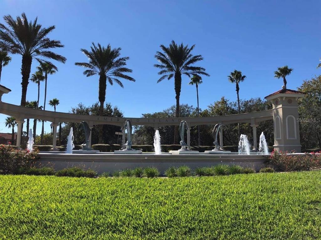 8521 Crystal Cove Loop Kissimmee, FL 34747 - Photo 18 of 23 a front view of multiple houses with yard