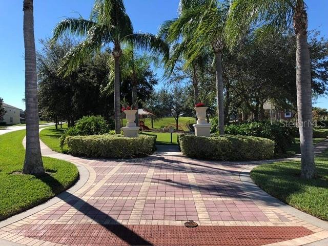 8521 Crystal Cove Loop Kissimmee, FL 34747 - Photo 21 of 23 a view of a garden
