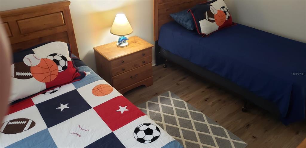 8521 Crystal Cove Loop Kissimmee, FL 34747 - Photo 9 of 23 a bathroom with a sink mirror and vanity
