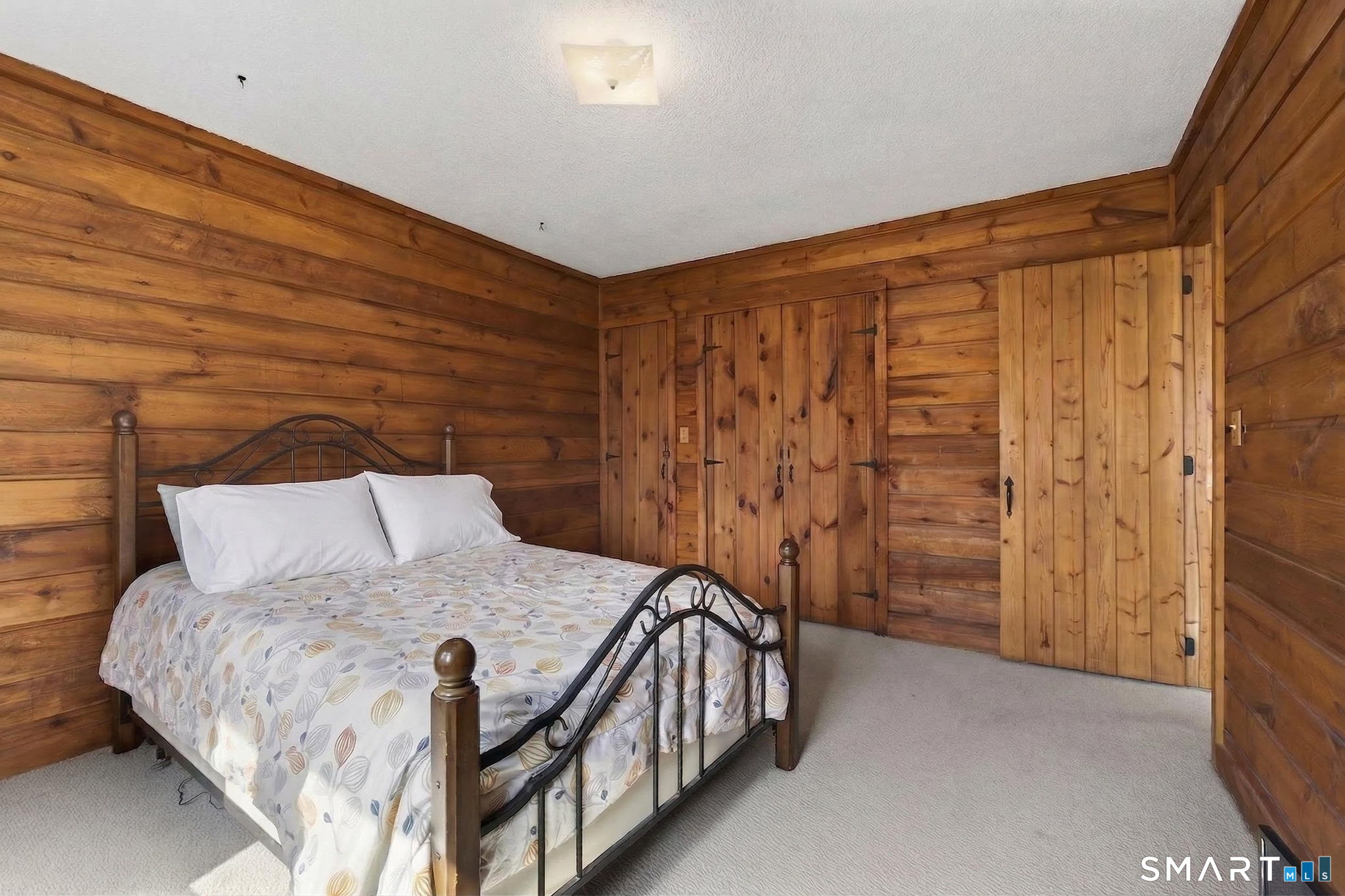 737 Shepard Avenue Hamden, CT 06514 - Photo 17 of 33 a bedroom with a bed and a cabinets