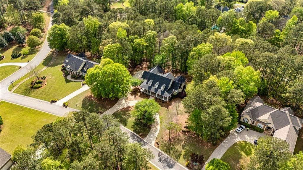 20 Jasmine Court Newnan, GA 30265 - Photo 56 of 72 an aerial view of residential house with outdoor space and trees all around