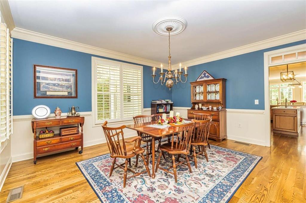 20 Jasmine Court Newnan, GA 30265 - Photo 8 of 72 a view of a dining room with furniture