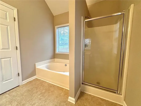 a bathroom with a toilet sink and a bathtub