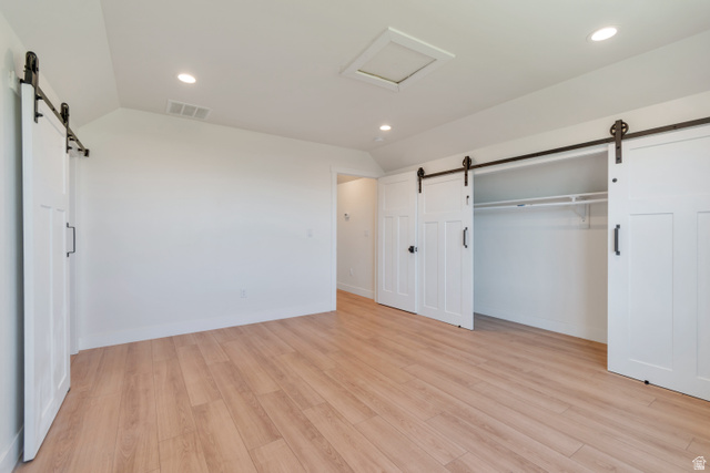 1820 West Farmhouse Flats Road Peoa, UT 84061 - Photo 53 of 79 Room featuring light wood-finish flooring, white walls, and recessed lighting