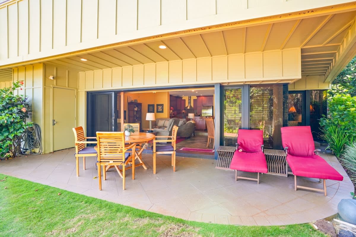 366 Papaloa Road, Unit 114 Kapaa, HI 96746 - Photo 16 of 23 a backyard of a house with outdoor seating