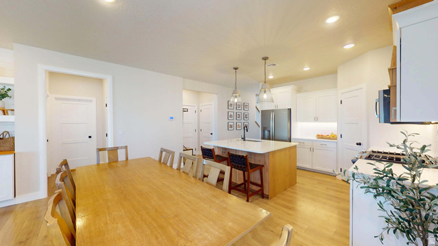 1127 4240 North Enoch, UT 84721 - Photo 9 of 56 Dining room featuring light wood finished floors and recessed lighting