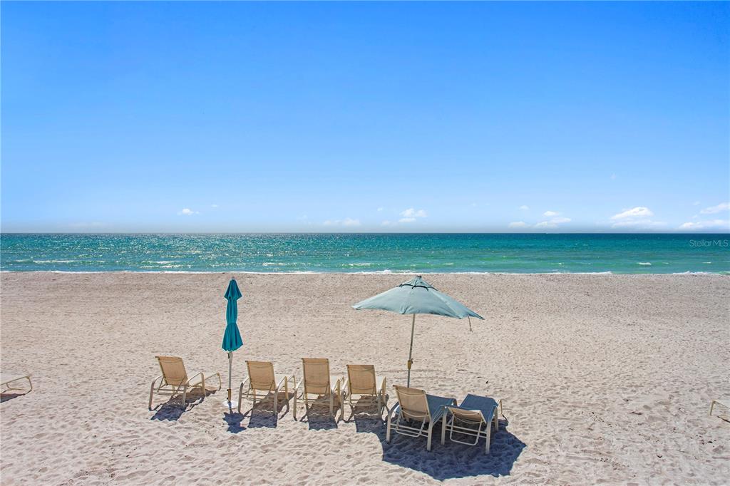 775 Longboat Club Road, Unit 808 Longboat Key, FL 34228 - Photo 34 of 41 a table and chairs in the terrace