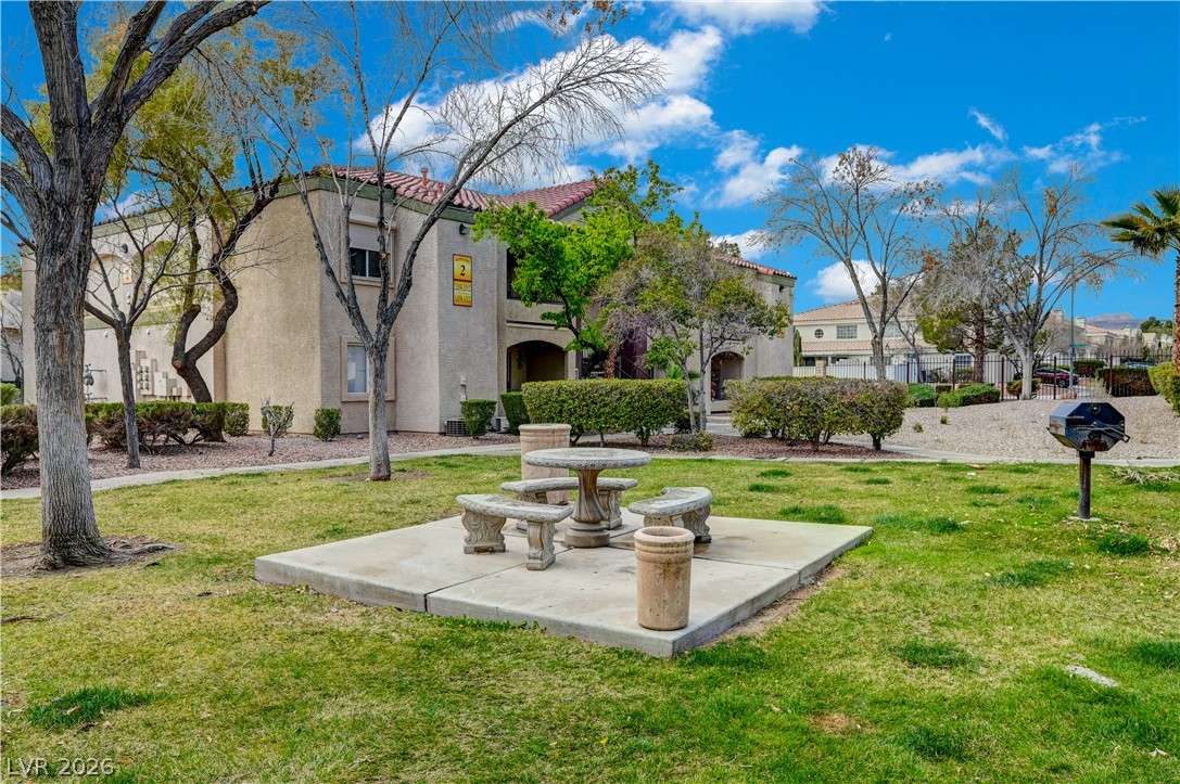 7885 West Flamingo Road, Unit 1050 Las Vegas, NV 89147 - Photo 52 of 62 A community picnic area with built-in barbecue awaits residents.
