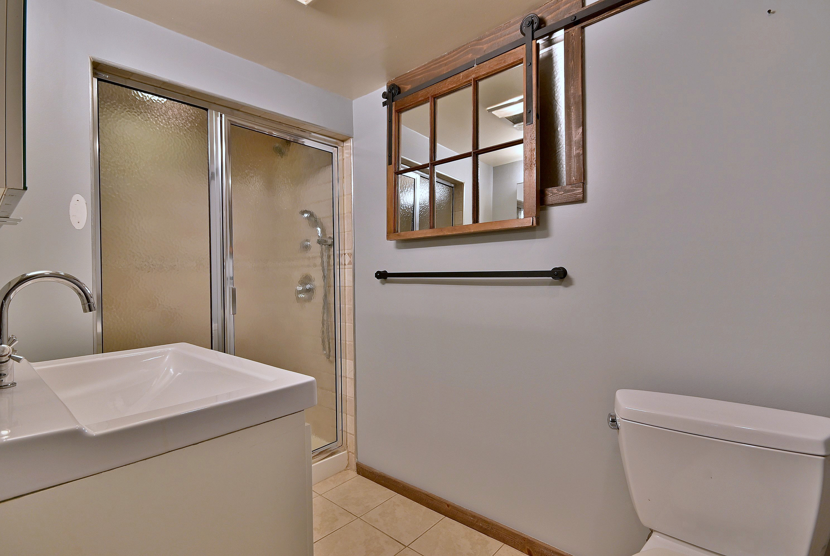 3952 North Oleander Avenue Chicago, IL 60634 - Photo 26 of 34 a bathroom with a granite countertop sink toilet and shower