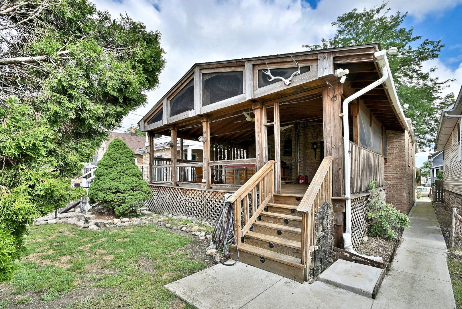 3952 North Oleander Avenue Chicago, IL 60634 - Photo 7 of 34 front view of a house with a yard