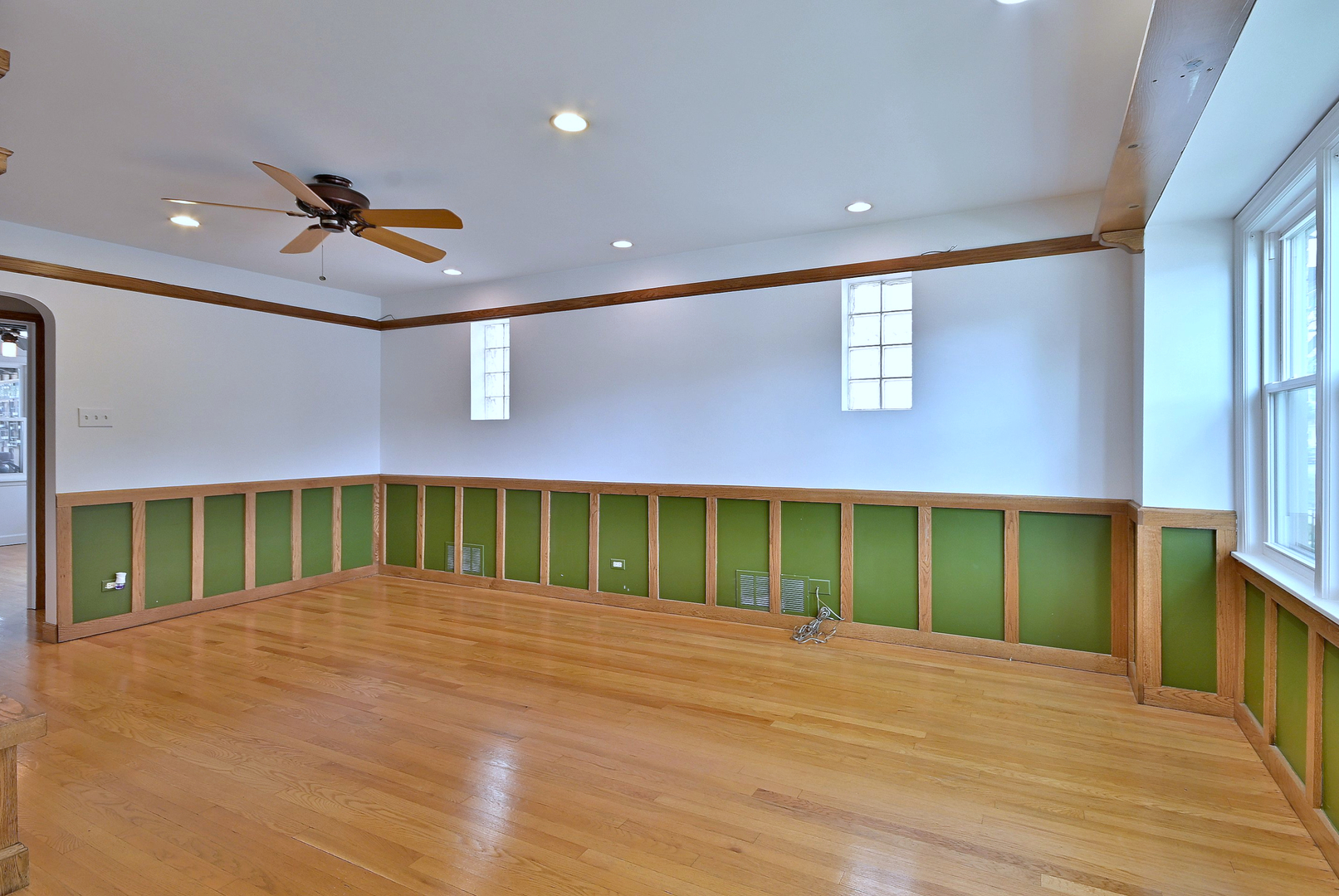 3952 North Oleander Avenue Chicago, IL 60634 - Photo 8 of 34 a view of a hall with a ceiling fan