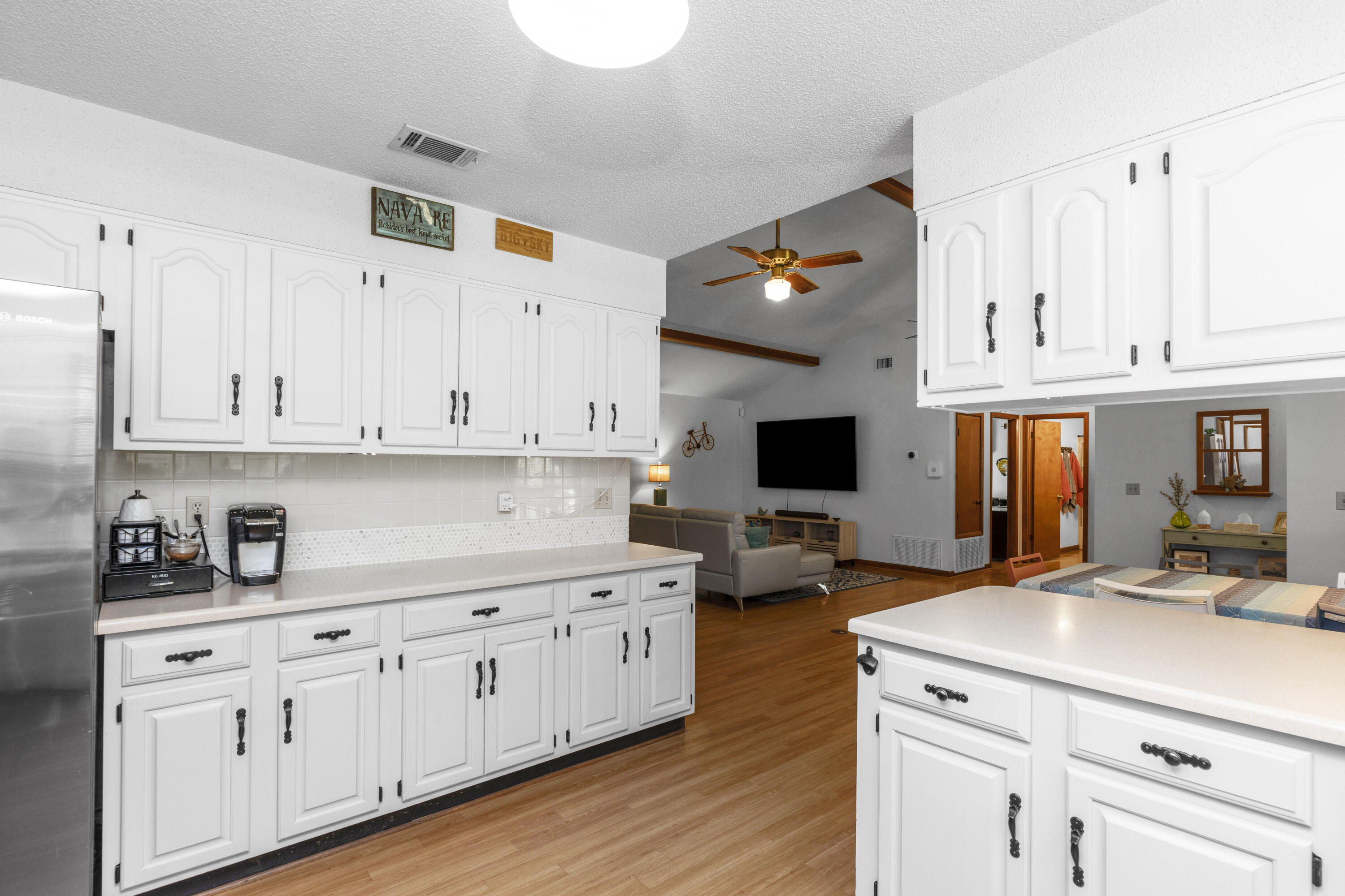 202 Wheeler Place Crestview, FL 32539 - Photo 12 of 40 a kitchen with white cabinets and sink