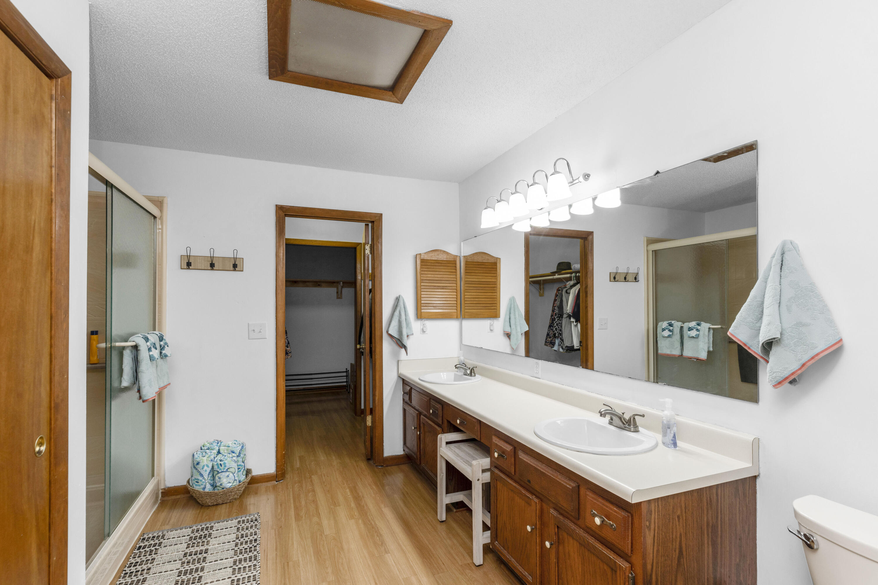 202 Wheeler Place Crestview, FL 32539 - Photo 25 of 40 a bathroom with a sink a vanity and a mirror