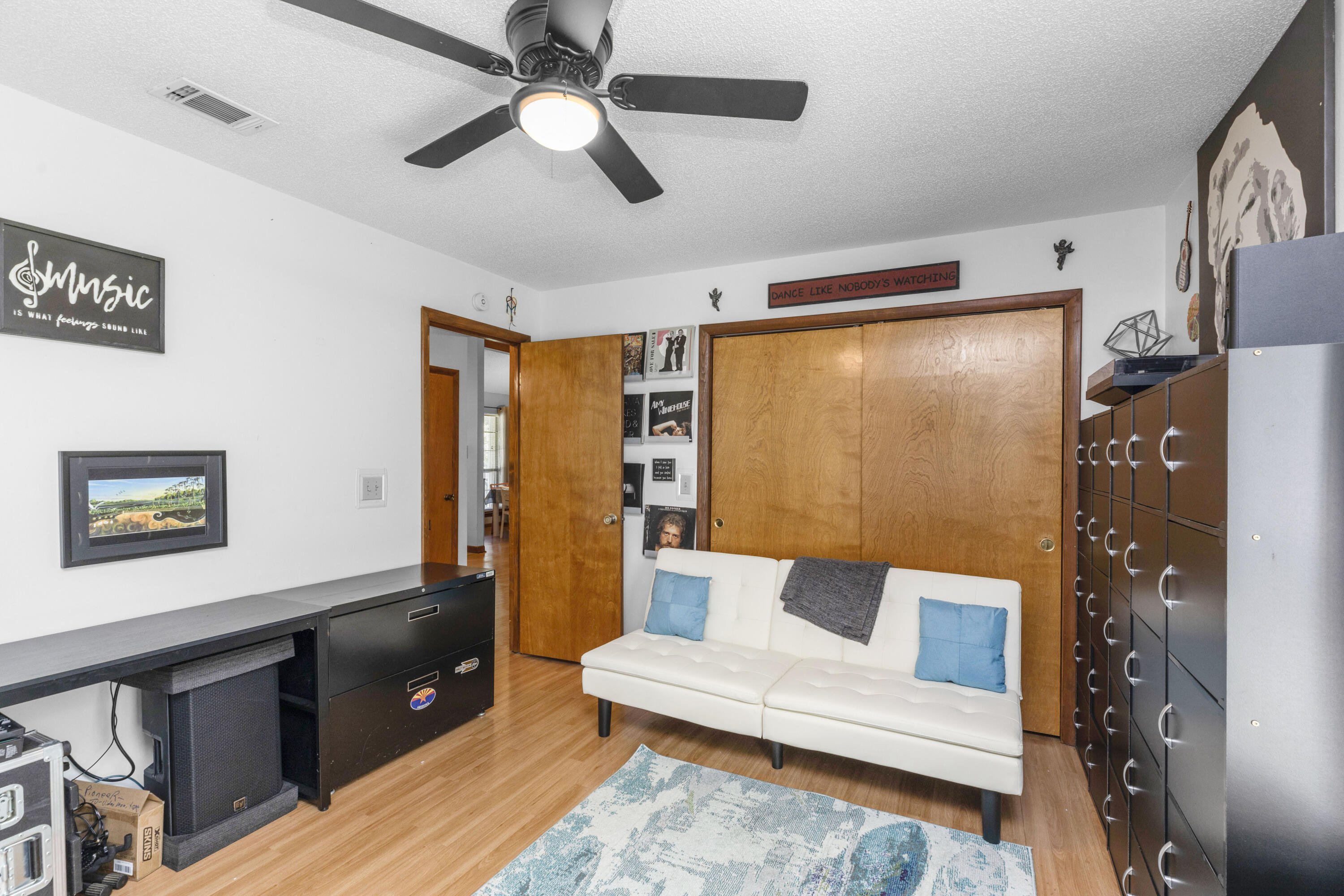 202 Wheeler Place Crestview, FL 32539 - Photo 36 of 40 a living room with furniture and a window