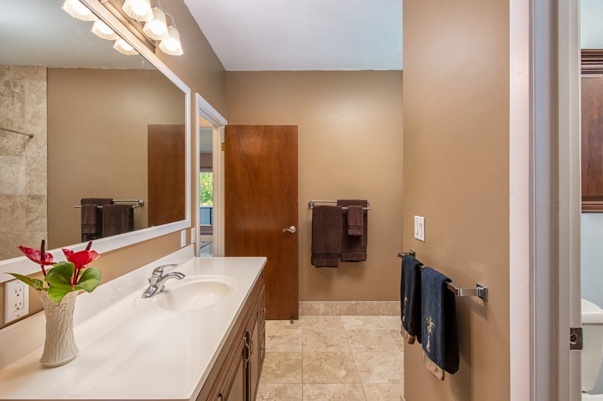 44-3265 Kalopa Mauka Road Honokaa, HI 96727 - Photo 15 of 30 a bathroom with a sink and a mirror