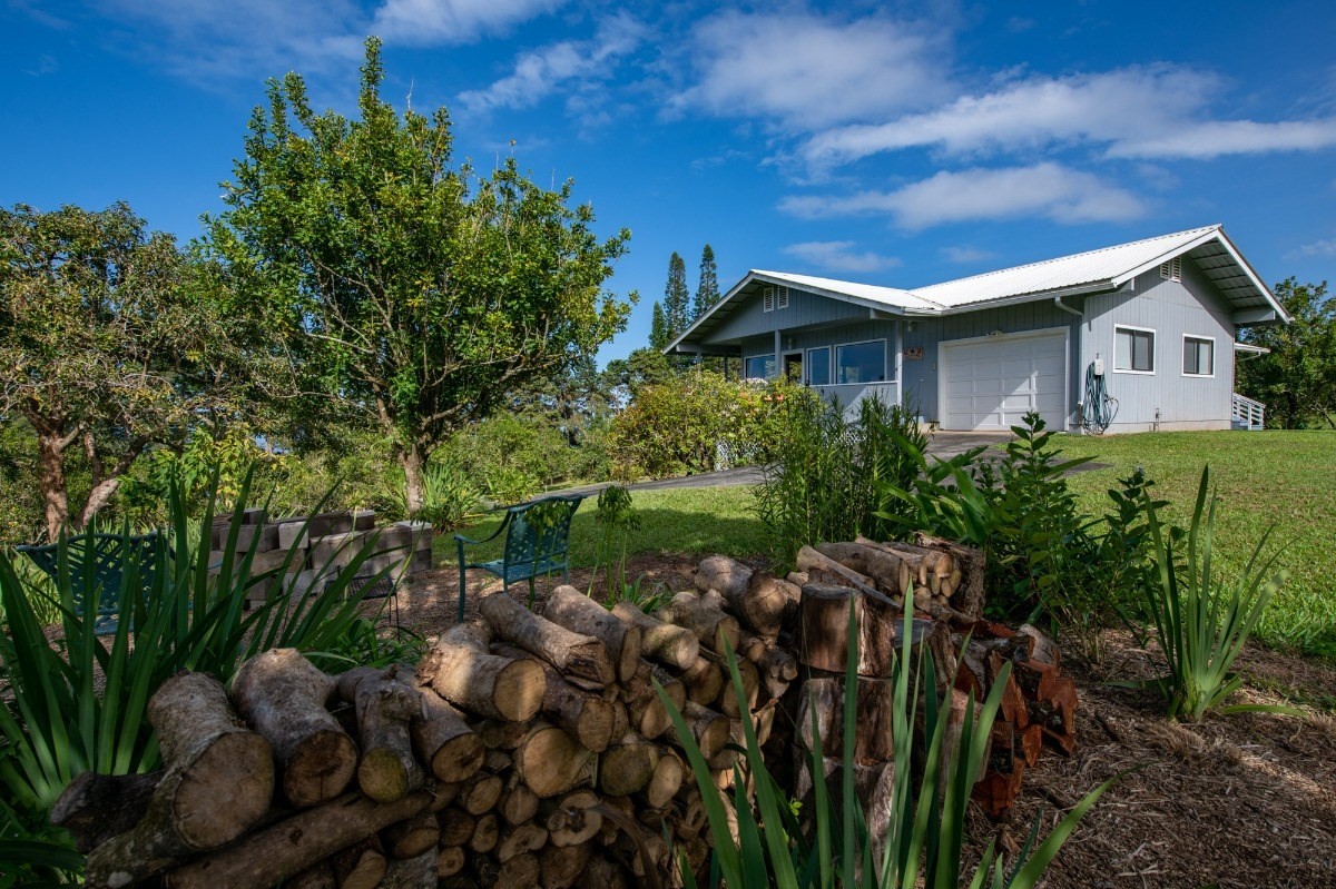 44-3265 Kalopa Mauka Road Honokaa, HI 96727 - Photo 2 of 30 a view of a house with a park