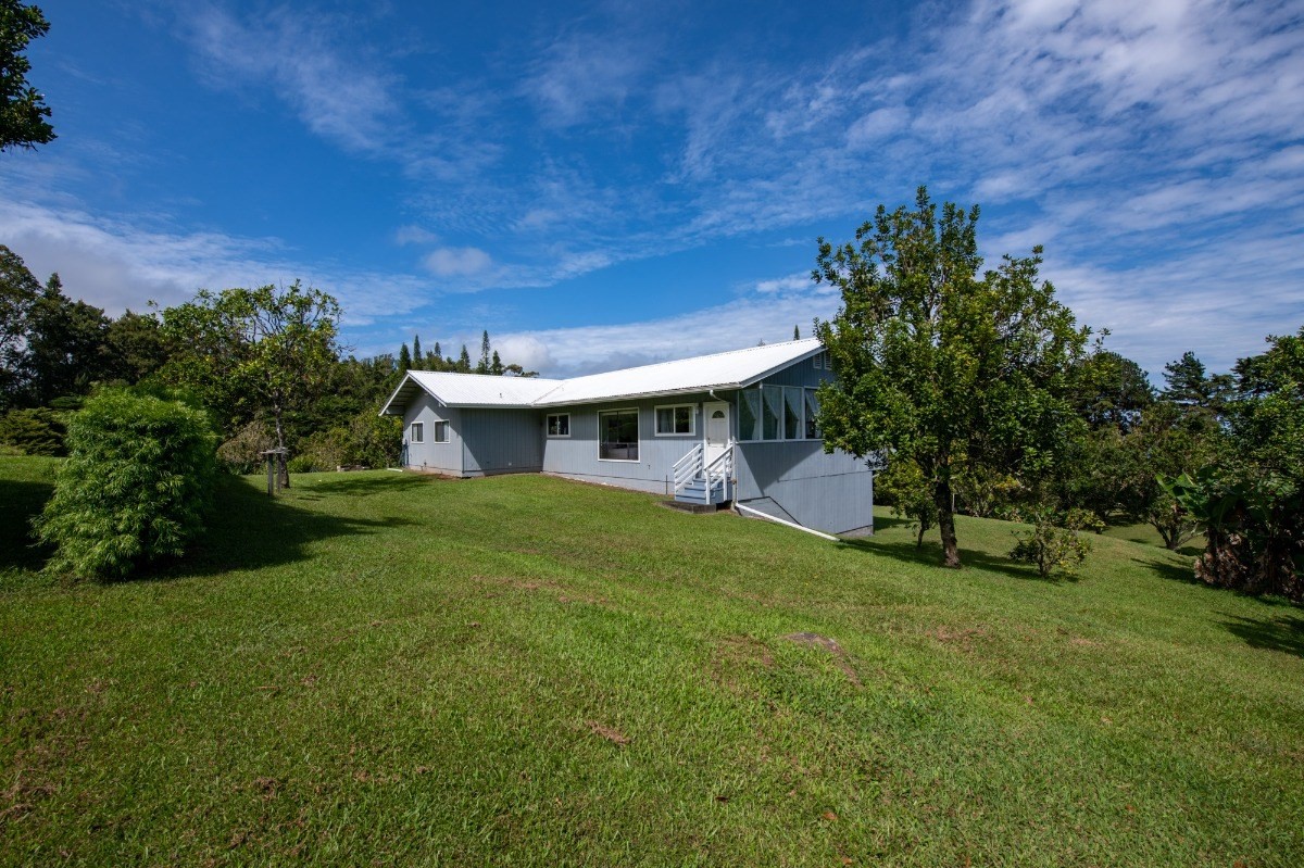 44-3265 Kalopa Mauka Road Honokaa, HI 96727 - Photo 21 of 30 a view of a house with a backyard