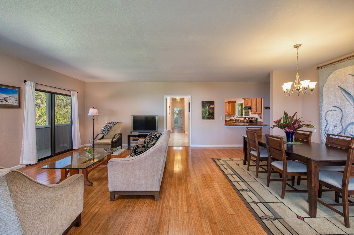 44-3265 Kalopa Mauka Road Honokaa, HI 96727 - Photo 9 of 30 a living room with furniture and a wooden floor