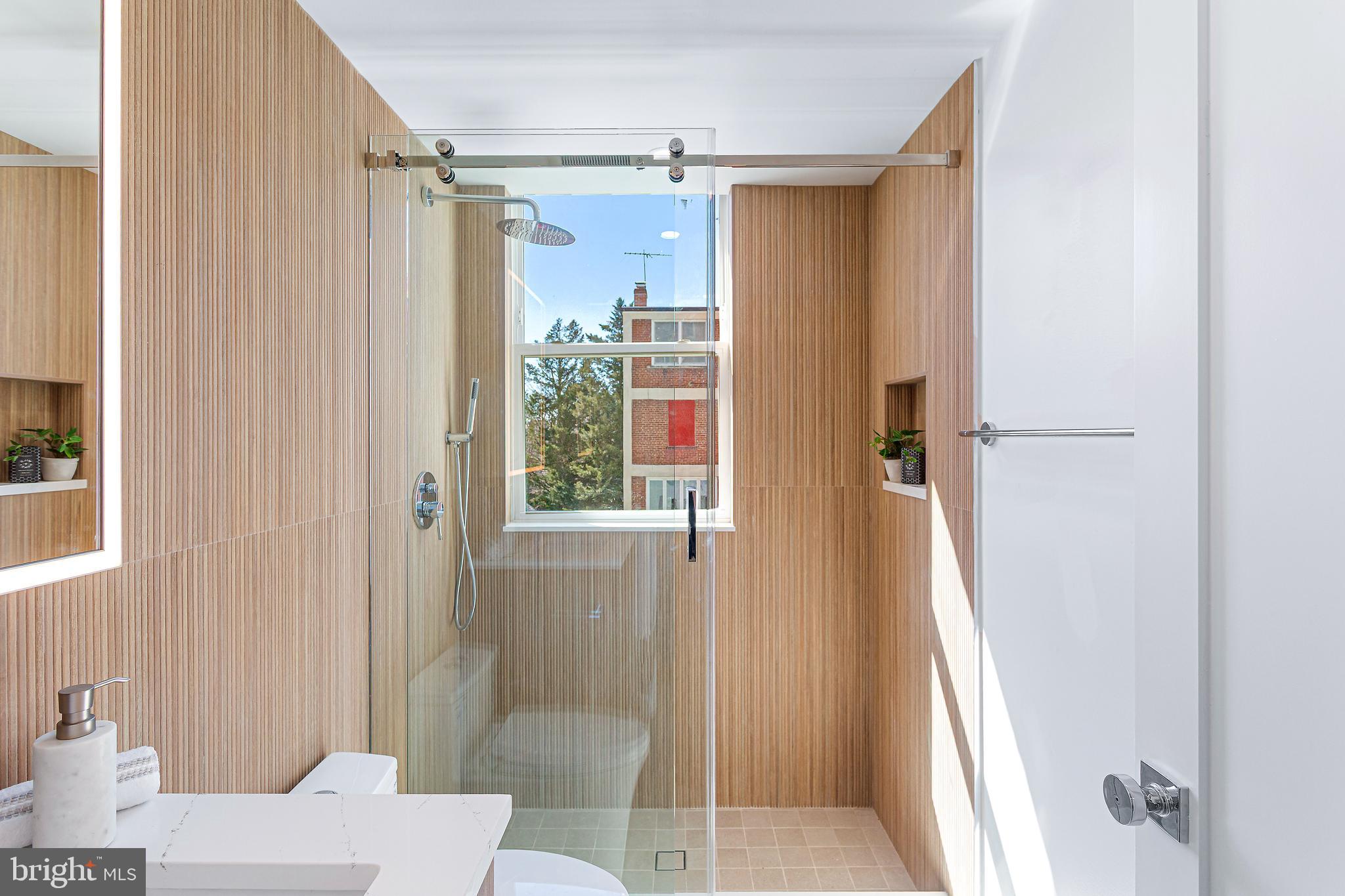 2116 Kalorama Road Northwest, Unit 202 Washington, DC 20008 - Photo 15 of 31 a bathroom with a shower and a toilet
