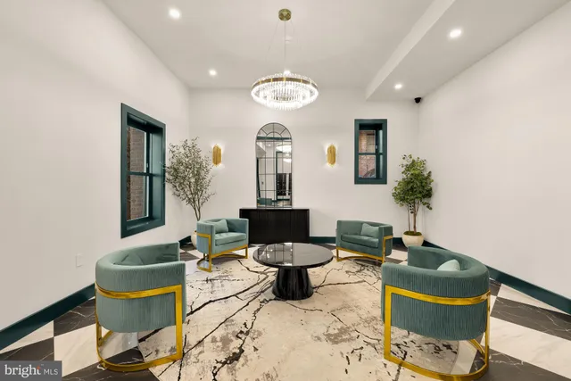 a view of a chairs and table in the backyard