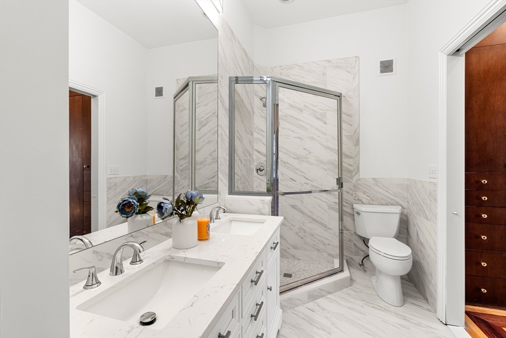 120 Beacon Street, Unit 3 Boston, MA 02116 - Photo 13 of 19 a bathroom with a sink a toilet and shower