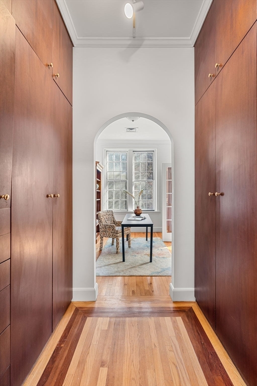 120 Beacon Street, Unit 3 Boston, MA 02116 - Photo 16 of 19 a view of a hardwood floor and a hallway view with wooden floor