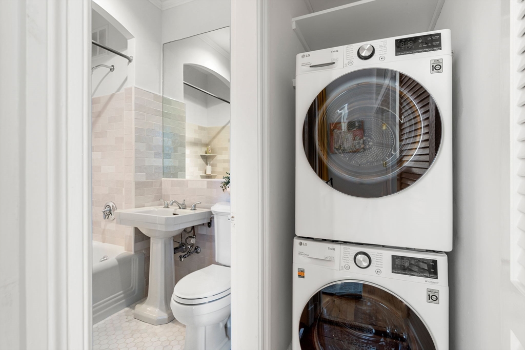 120 Beacon Street, Unit 3 Boston, MA 02116 - Photo 8 of 19 a view of a bathroom with washing machine and sink