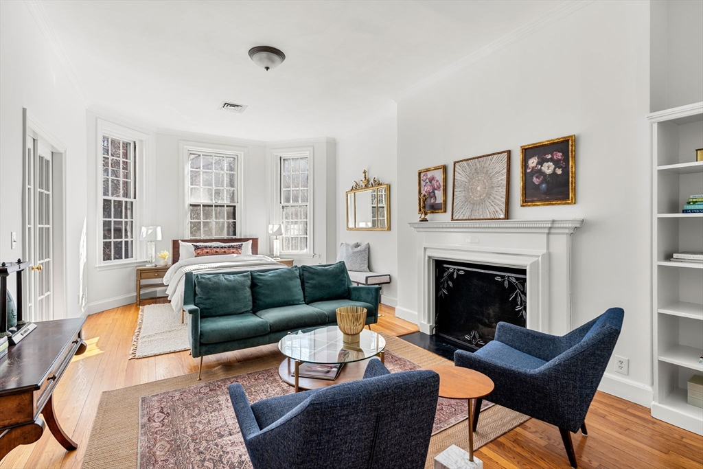 120 Beacon Street, Unit 3 Boston, MA 02116 - Photo 10 of 19 a living room with furniture and a fireplace