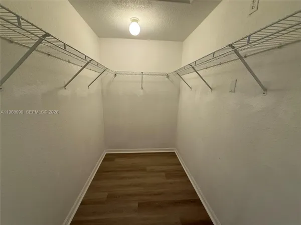 a view of a room with racks on the wall