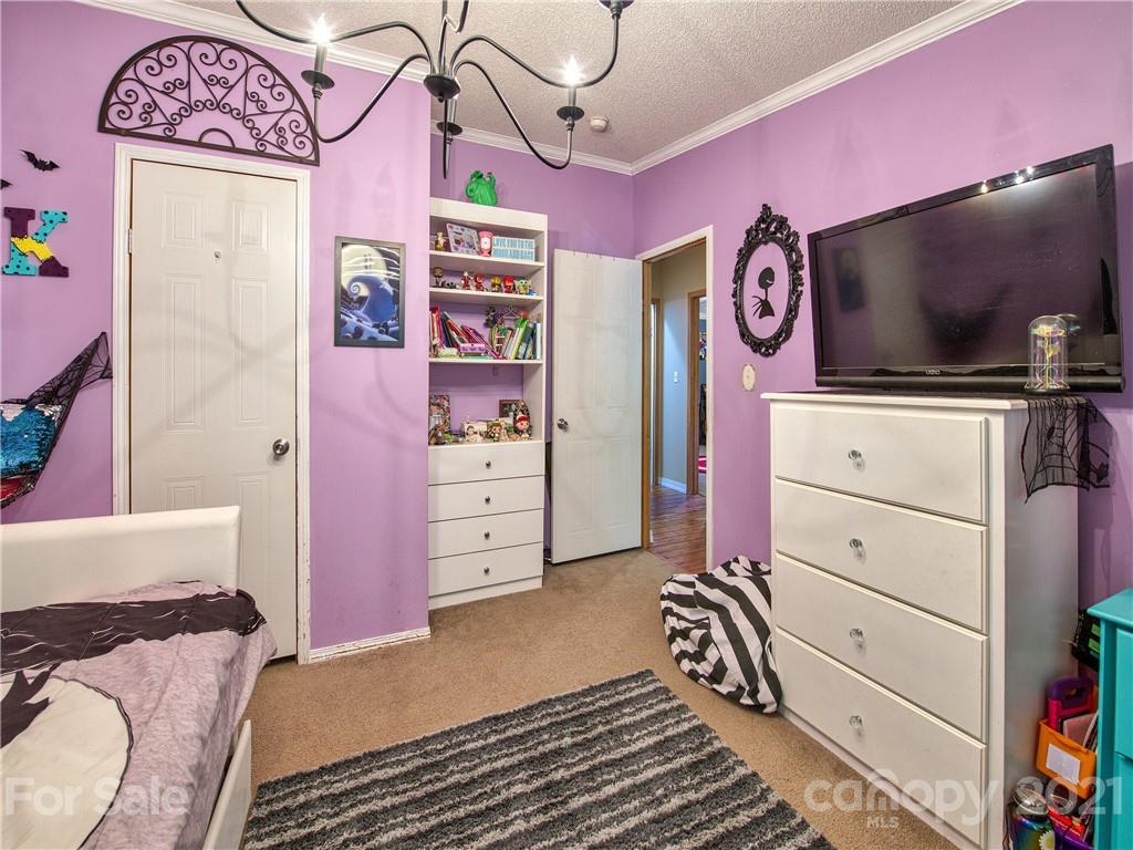 485 Loop Road Clyde, NC 28721 - Photo 23 of 33 a view of a dresser with workspace