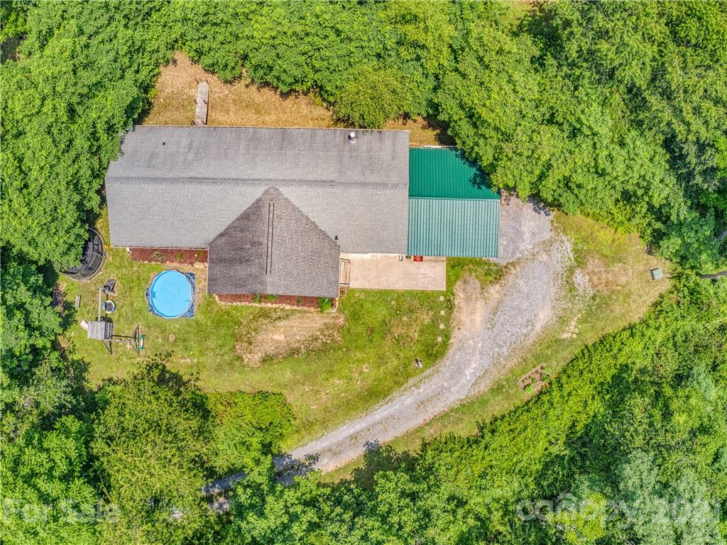 485 Loop Road Clyde, NC 28721 - Photo 31 of 33 an aerial view of a house