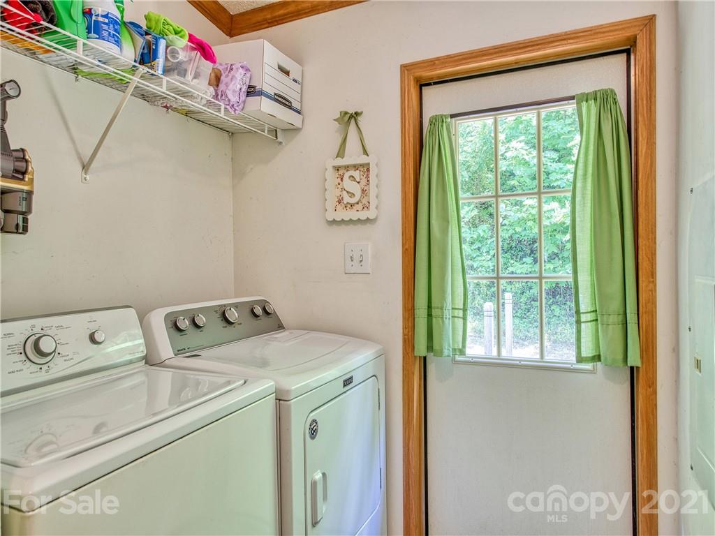 485 Loop Road Clyde, NC 28721 - Photo 33 of 33 a utility room with dryer and washer