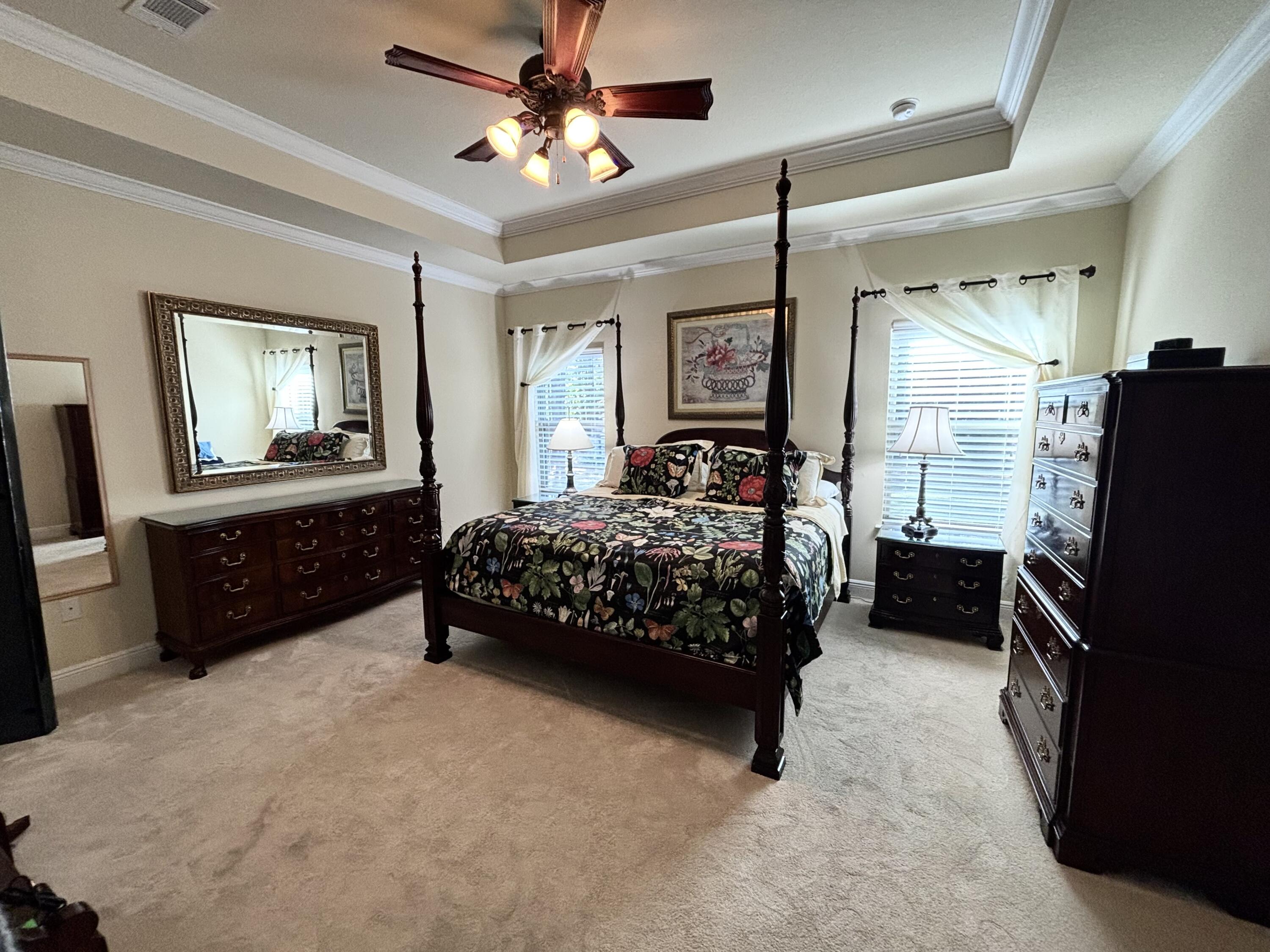 14 Lullaby Lane Freeport, FL 32439 - Photo 13 of 15 a bedroom with a bed dresser and a window
