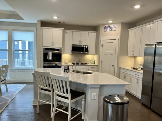 a view of a balcony with furniture