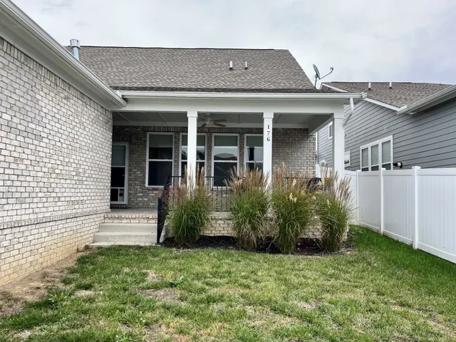 a bathroom with a sink a toilet and bathtub