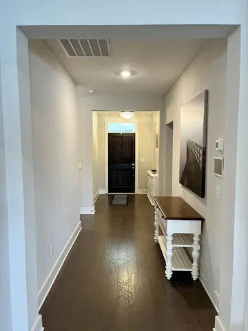 a living room with fireplace furniture and a flat screen tv