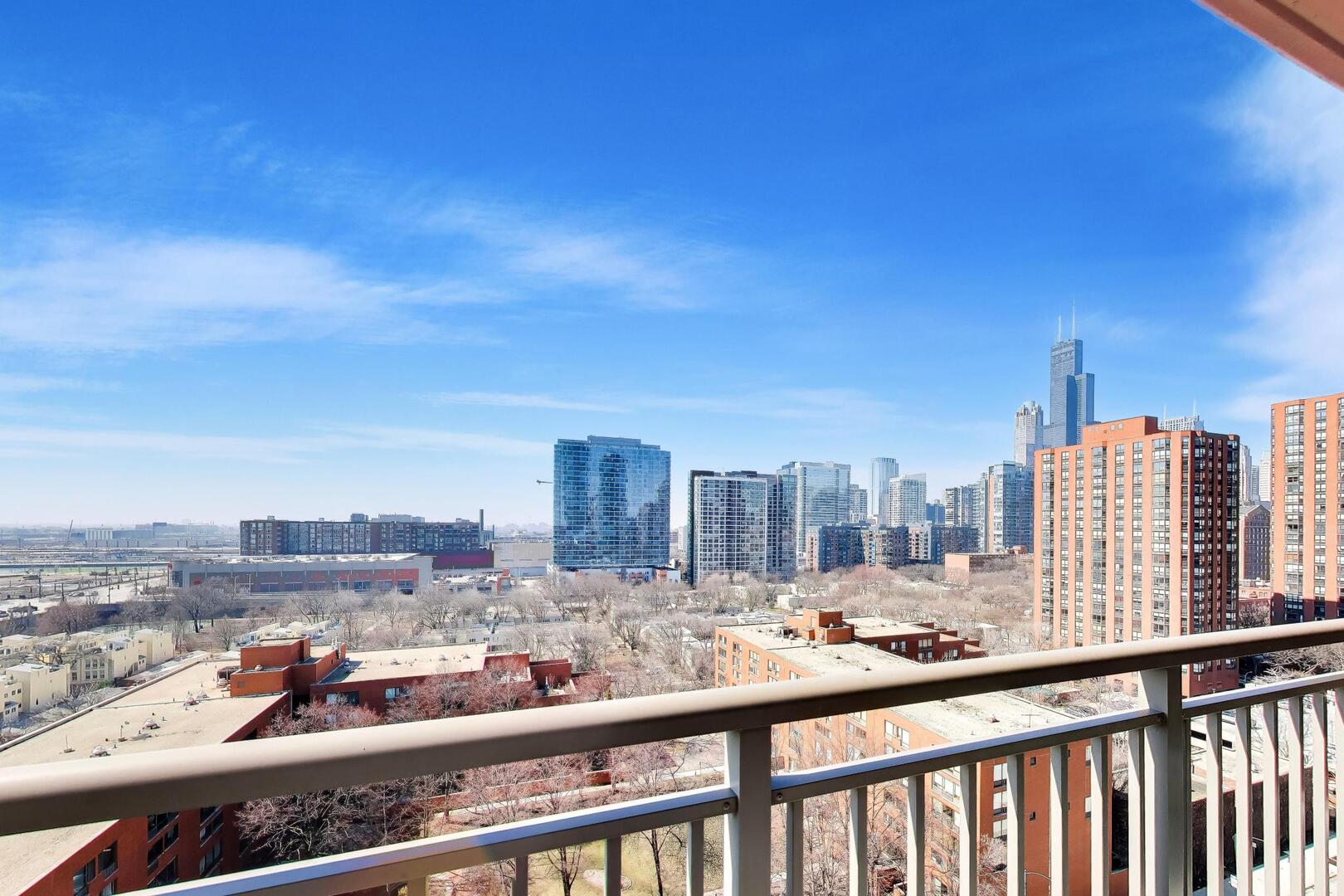 1101 South State Street, Unit 1307 Chicago, IL 60605 - Photo 27 of 31 a view of a city from a balcony